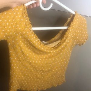 A yellow polkadot croptop